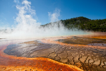 Grand Prismatic Spring in Yellowstone National Park with emphasis on the colorful runoff on the ground surface