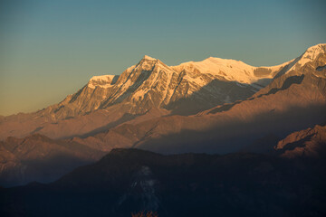  Himalayan mountain Dhaulagiri peak during sunrise in Nepal.