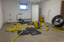 Drying A Concrete Floor Under A Fabric Covering. After Pouring, Initial Drying, And Then Drilling And Blowing Hot Air