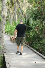 Canvas Print - man hiking in the woods