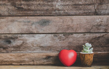 Valentine Red Heart Decorated With Cactus Pots On Wooden Rustic Background