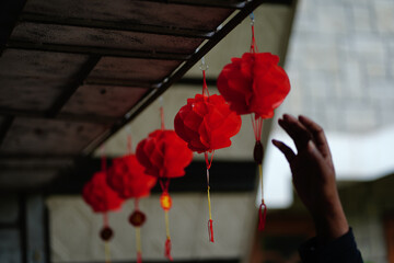 Wall Mural - Red lanterns during Chinese new year festival, Chinese new year decoration. Close up Beautiful traditional Chinese Lantern lamp in red color, selective focus.