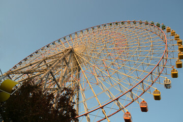 ferris wheel on a blue sky