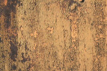 Wall Mural - Peeling paint rusting metal rough texture.  background of peeling paint and rusty old metal