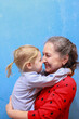 © DariaTrofimova - Grandmother hugging with her cute granddaughter