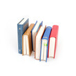 © Elena - Stack of books in colour covers with white sheets isolated on a white background