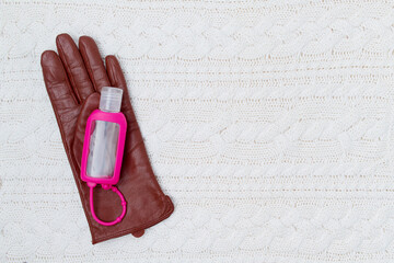 Wall Mural - winter flat lay with gloves and disinfectant