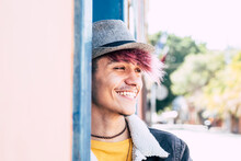 Happy Cheerful Young Alternative Teenager Smile Outdoor In Diversity Concept Portrait -violet Hair And Hat For Trendy Stylish People Enjoying Leisure Activity