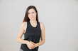 © Marianna - Young brunnete with sportswear on a white background