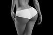 © PixlMakr - Slim tanned woman's body