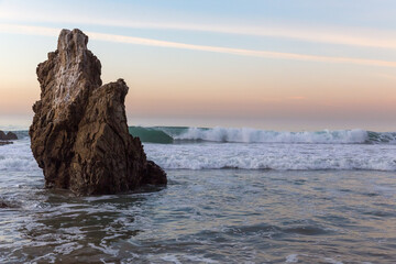 Poster - Ocean waves and sea stack on El Matador Beach at sunrise 