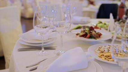 Poster - wedding table in a restaurant with food and glasses