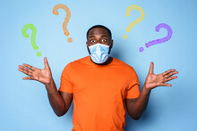 Boy With Face Mask Has A Lot Of Question About Covid 19. Cyan Background