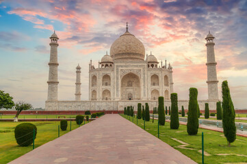 Fototapete - Taj Mahal Agra with moody sunrise sky. A UNESCO World Heritage site at Agra India	