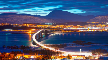 Canvas Print - Beautiful or Urban landscape of Tromso in Northern Norway at twilight blue hour - Arctic city of Tromso with bridge -Tromso, Norway