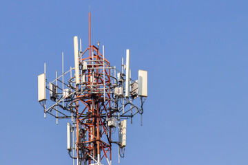 Telecommunication tower with blue sky and white clouds background,satellite pole communication technology.