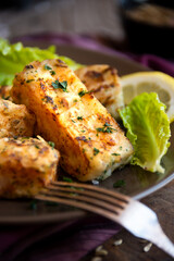 Wall Mural - Cooked fish fillet with lemon and vegetables