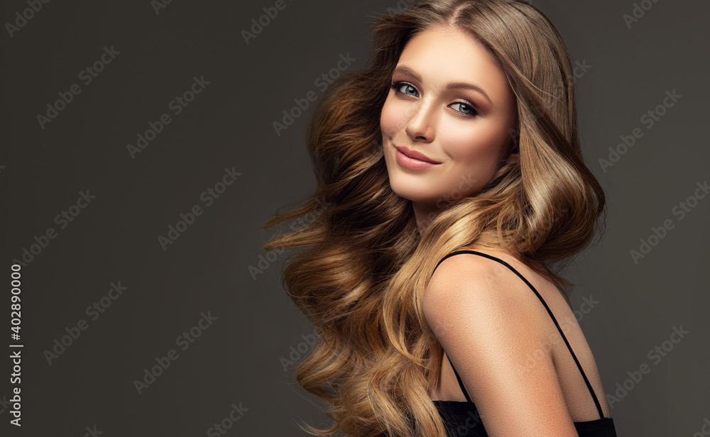 Beauty blonde girl with long and shiny wavy hair . Beautiful woman ...