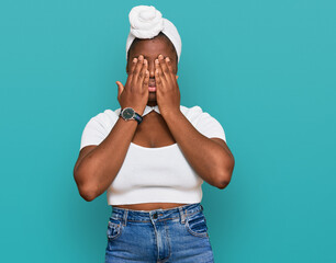 Sticker - Young african woman with turban wearing hair turban over isolated background rubbing eyes for fatigue and headache, sleepy and tired expression. vision problem