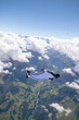 © Talent for Adventure - Wingsuit flier glides high above land