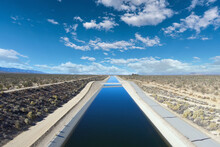 View Of The California Aqueduct Moving Water Through The Mojave Desert Towards Los Angeles.