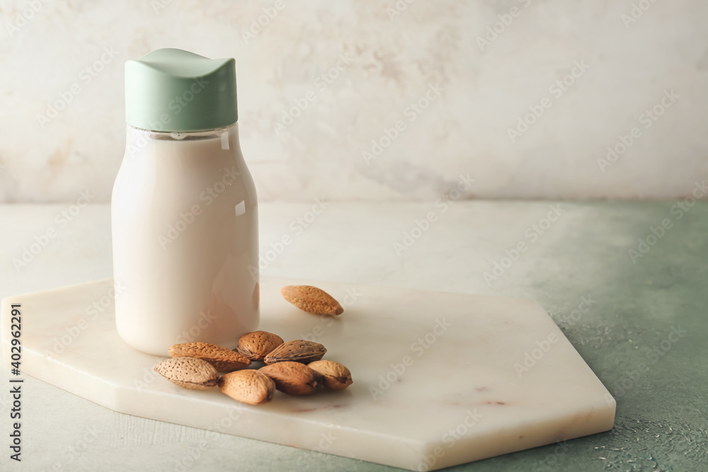 Bottle of almond milk on table