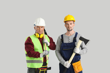 Wall Mural - Miner men on grey background