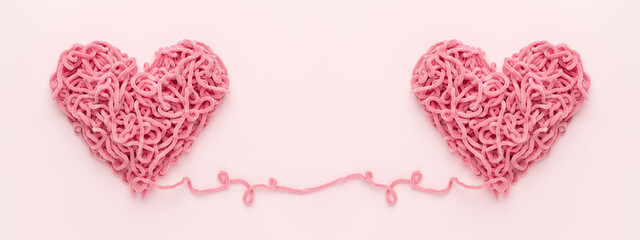 Wall Mural - Valentines Day banner, two Hearts connected together. Love concept. Copy space, couple in love symbol.