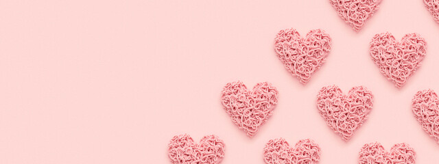 Wall Mural - Valentines Day Banner. Hearts on pink background. Copy space, Flat lay.