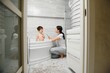 © Serhii - Mother washing little son in bathroom