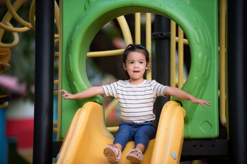 Little children having fun in the playground