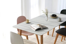 White Kitchen Interior With Dining Table