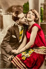 Wall Mural - Germany - CIRCA 1920s: Vintage art deco era photo. Lovers sitting. Couple portrait in studio. Hand coloured photograph