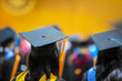 © atsarapong - Graduation cap image from the back of graduates Graduates attending the university graduation ceremony