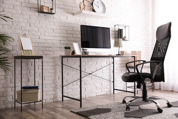 Wall Mural - Comfortable chair near desk in modern office interior