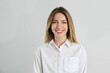 © New Africa - Portrait of beautiful young businesswoman on white background
