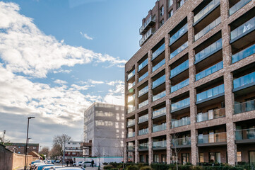 Wall Mural - London, United Kingdom, January 04, 2021: New modern apartment block of flats on the Green Street, Upton Gardens, former site of West Ham football ground, Upton Park, Newham