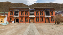 Orange Colored House At Labrang Monastery. Typical Tibetan Architecture.