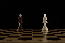 Two Chess Kings Are On Black Background