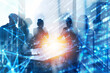 © alphaspirit - Background concept with business people silhouette at work. Double exposure and light effects