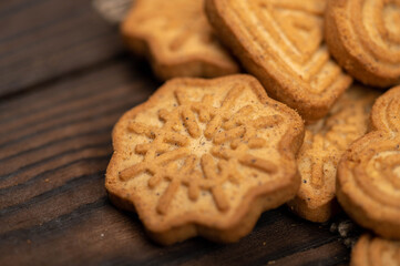 Delicious homemade cookies on a wooden table. Close-up selective focus.