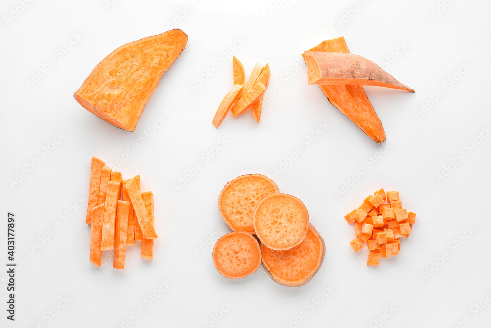 Fresh sweet potatoes on white background