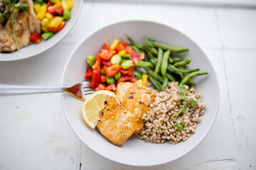 Salmon and buckwheat dish with green beans and tomato