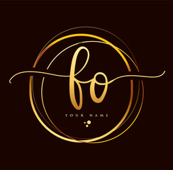 FO Initial handwriting logo golden color. Hand lettering Initials logo branding, Feminine and luxury logo design isolated on black background.