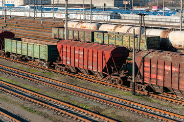 Kyiv (Kiev), Ukraine - January 2, 2020: Old and rusty freight cargo train, carriages, tank truck, oil tank car, cistern car, railroad, railway