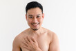 © Sevendeman - Topless portrait of a happy Asian man on isolated white background.