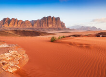 Wadi Rum Desert, Jordan. The Red Desert And Jabal Al Qattar Mountain.