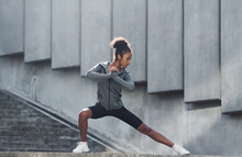 Conception Of Sport. Young African American Woman In Sportive Clothes Have Workout Outdoors At Daytime