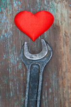 Red Heart Fixed By The Wrench. Healing Love Concept
