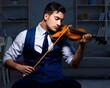 © Elnur - Young musician man practicing playing violin at home
